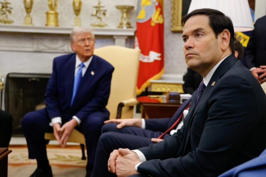 US Secretary of State Marco Rubio looks on as US President Donald Trump meets with French