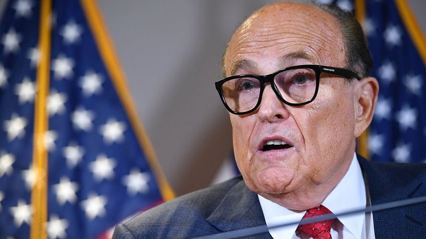 Trump's personal lawyer Rudy Giuliani speaks during a press conference at the Republican National Committee