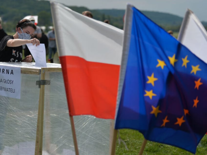 ruling conservatives make election choice between polish sovereignty and german interference