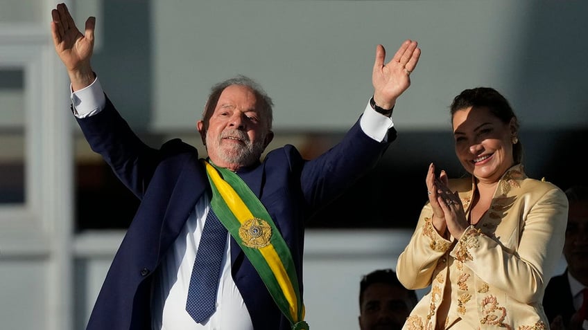 Brazil President Luiz Inacio Lula da Silva waves at inauguration