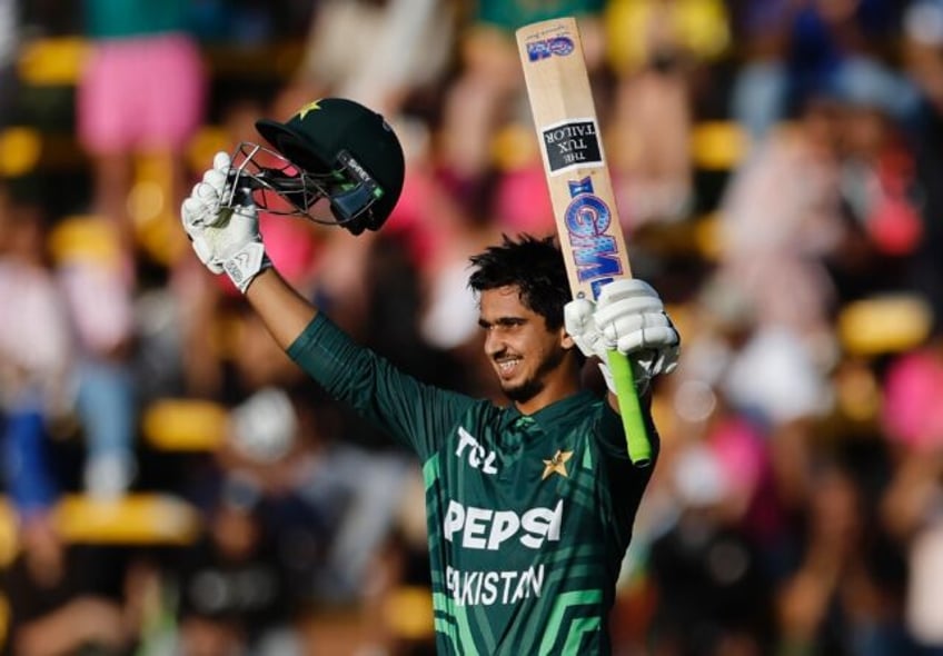 Century star: Pakistan's Saim Ayub celebrates after scoring a hundred in Sunday's win over