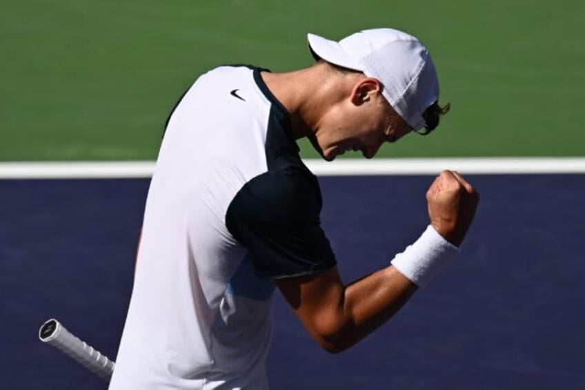 Denmark's Holger Rune celebrates his semi-final victory over Russian Daniil Medvedev at In