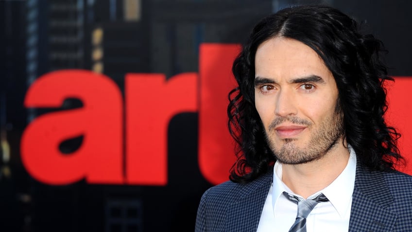 russell brand faces accusation of sexually assaulting extra on the set of his movie arthur in new lawsuit