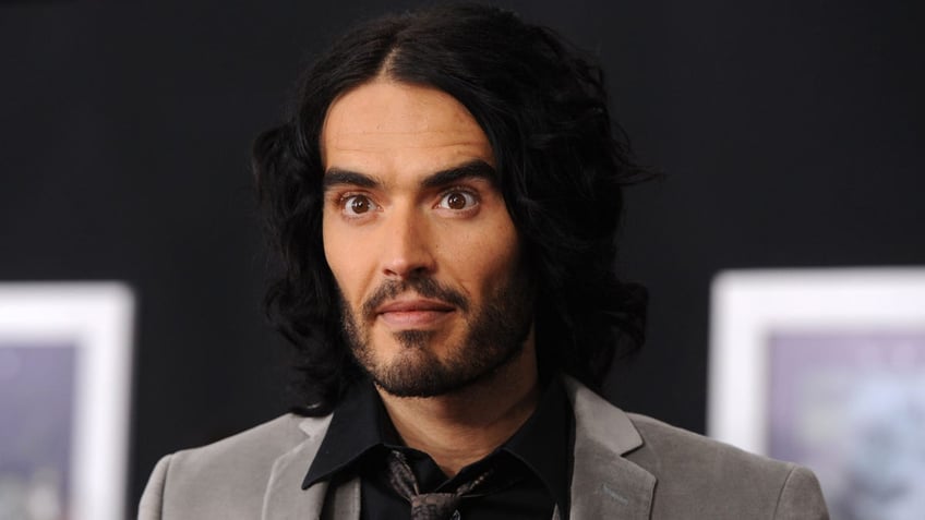 russell brand faces accusation of sexually assaulting extra on the set of his movie arthur in new lawsuit