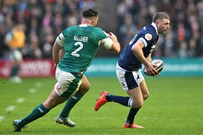 Scotland fly-half Finn Russell (R) is expected to play against England on Saturday