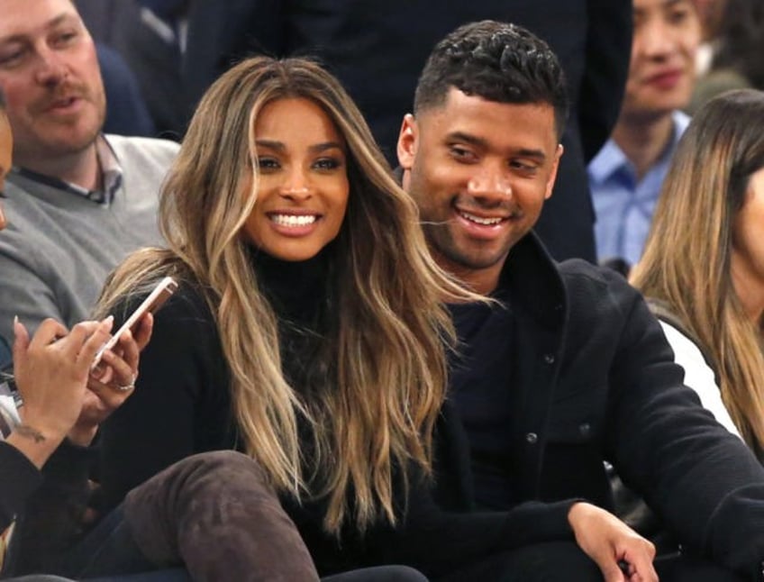 russell wilson on why he cancelled nc wedding i just believe jesus loves all people