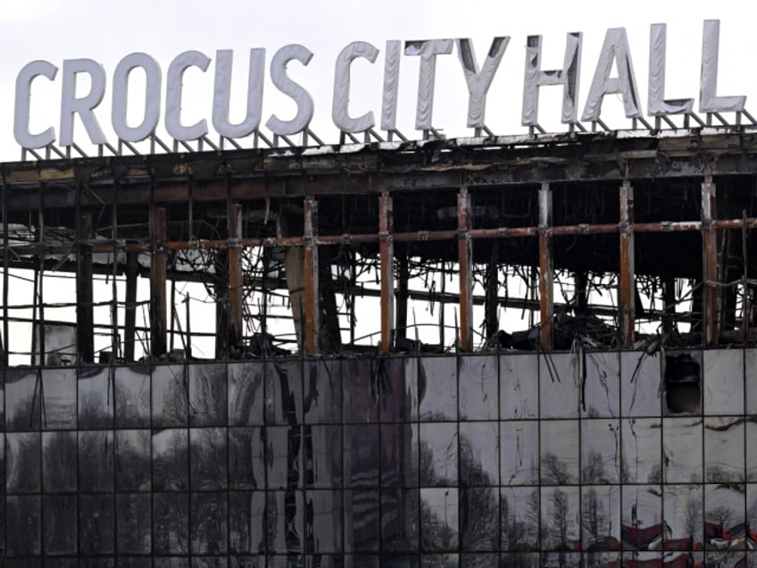 A view shows the burnt-out Crocus City Hall concert venue in Krasnogorsk, outside Moscow, on March 26, 2024. At least 139 people were killed when gunmen in camouflage stormed Crocus City Hall, shooting spectators before setting the building on fire in the most fatal attack in Europe to have been claimed by Islamic State jihadists. (Photo by NATALIA KOLESNIKOVA / AFP) (Photo by NATALIA KOLESNIKOVA/AFP via Getty Images)