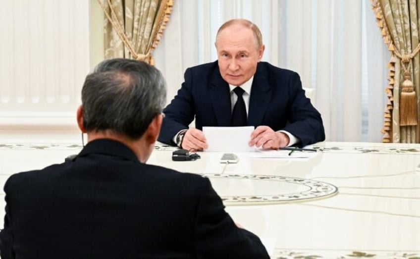 Russia's President Vladimir Putin meets China's Premier Li Qiang at the Kremlin