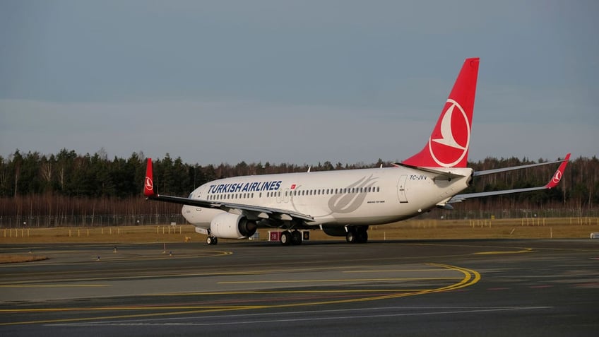 Turkish Airlines Boeing 737-800 plane TC-JVV taxies to take-off in Riga International Airport