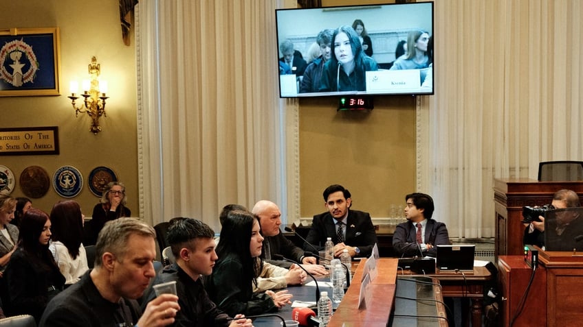 Ksenia Koldin testifies at the Helsinki Commission Hearing about how 19,000 Ukrainian children have been kidnapped by Russia. (Myong-Hun Oh)