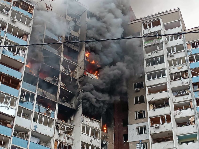 KYIV, UKRAINE - FEBRUARY 7, 2024 - A fire caused by the falling fragments of a Russian missile rages in a block of flats in the Holosiivskyi district after the Russian missile attack on Wednesday morning, Kyiv. (Photo credit should read Serhii Loparev / Ukrinform/Future Publishing via Getty Images)