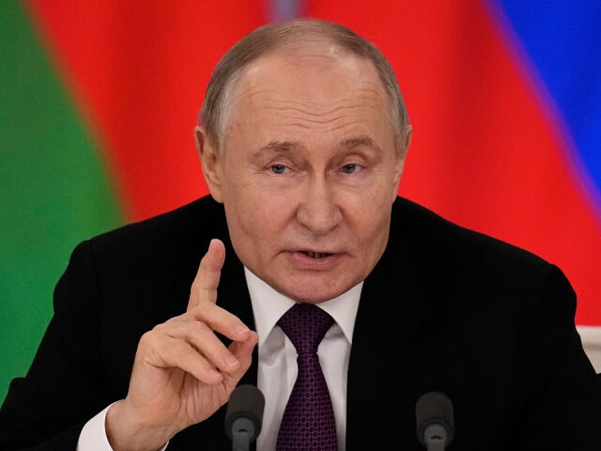 Russian President Vladimir Putin speaks during a joint news conference with Belarusian Pre