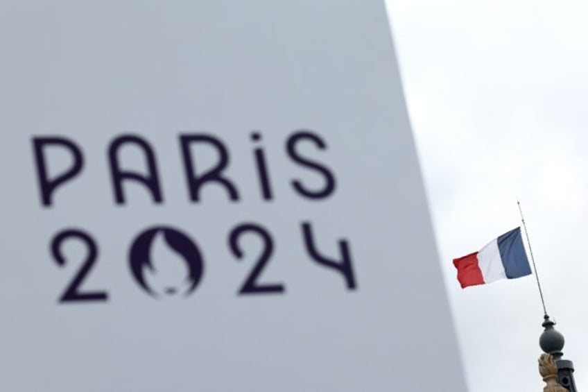 A sign for the Olympics is seen at La Concorde in Paris ahead of the 2024 Games