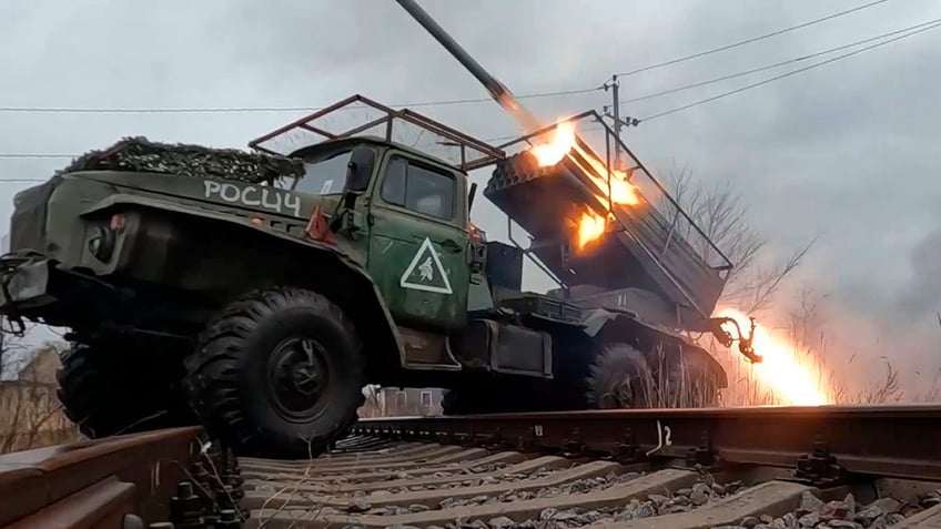 A rocket is fired from the Russian army's Grad rocket launchers at an undisclosed location in Ukraine. 