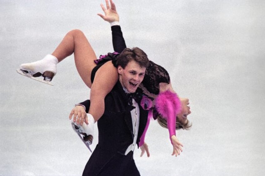 Russian pairs skaters Vadim Naumov and Evgenia Shishkova on their way to gold at the world