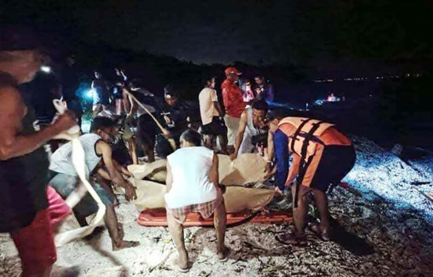 Two Russian divers were found dead, one in the jaws of a shark, in a popular Philippine sc