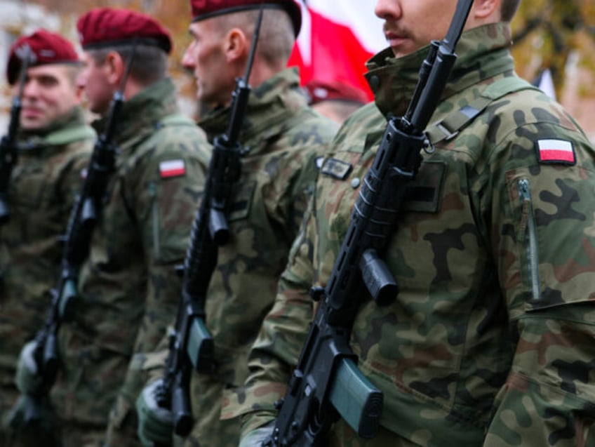 KRAKOW, POLAND - NOVEMBER 11: Patriotic procession walking through the city streets during Independence Day celebrations on November 11, 2023 in Krakow, Poland. On November 11, Poland celebrates National Independence Day. To celebrate Poland regaining independence in 1918, after 123 years of partition, Krakow first held a mass in the …