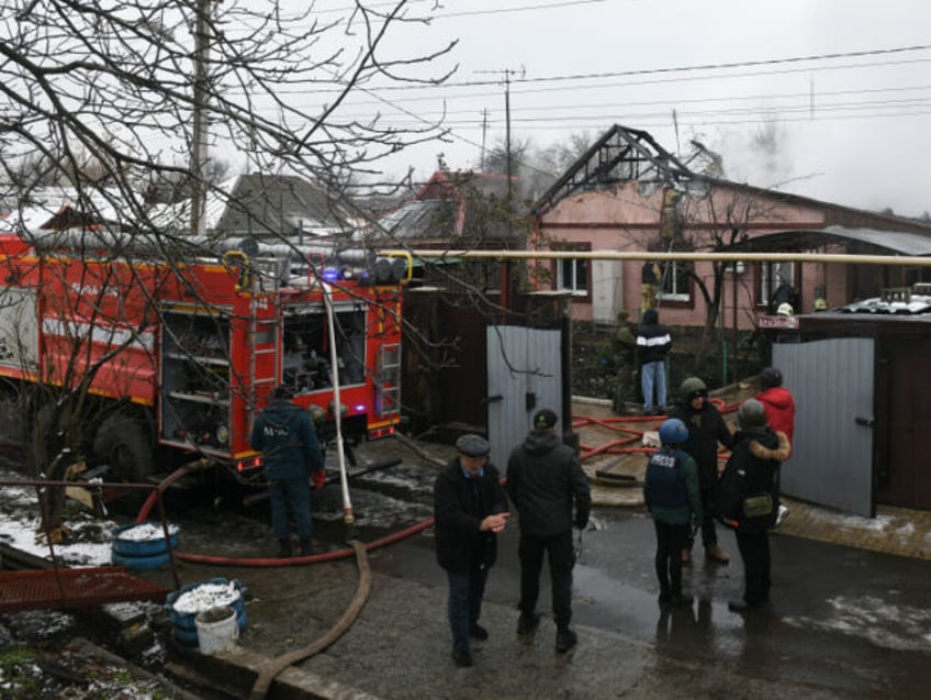 russian missile strikes in eastern ukraine busy families in rubble