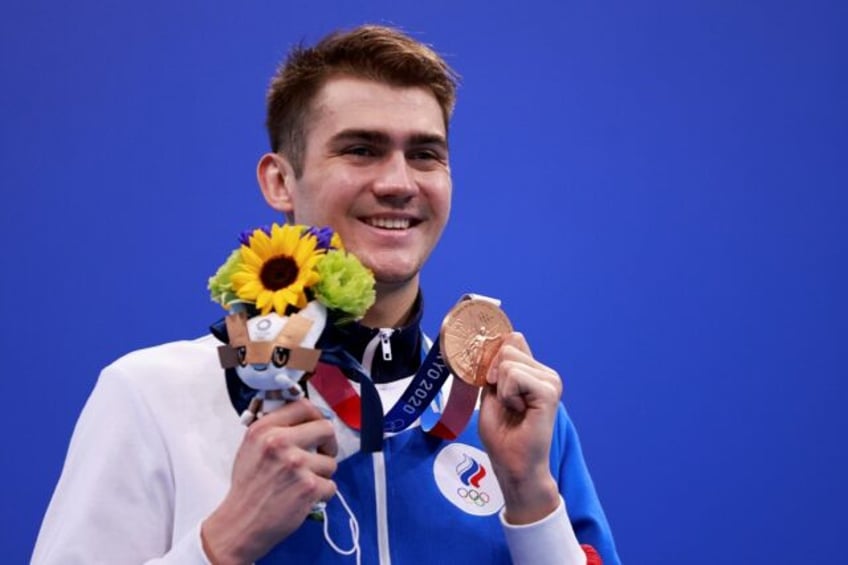 Russia's Kliment Kolesnikov won bronze in the 100m freestyle and silver in the 100m backstroke at the Tokyo 2020 Olympic Games