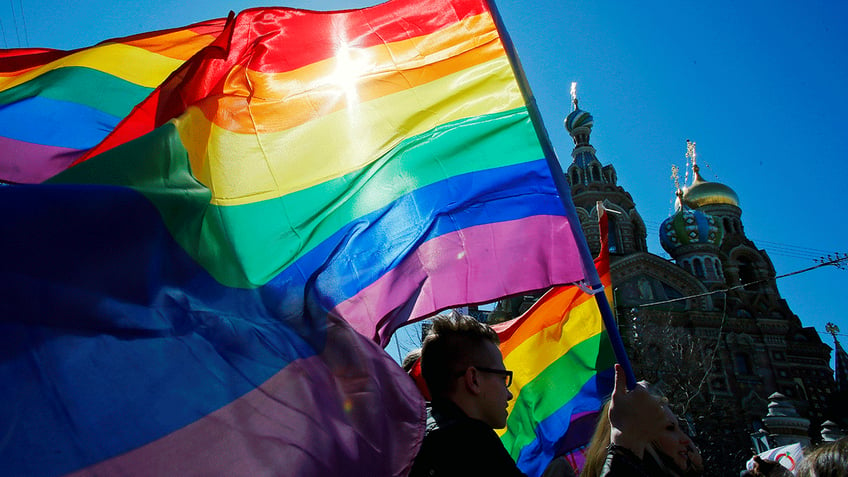 russias supreme court bans lgbtq activism labeling it extremist