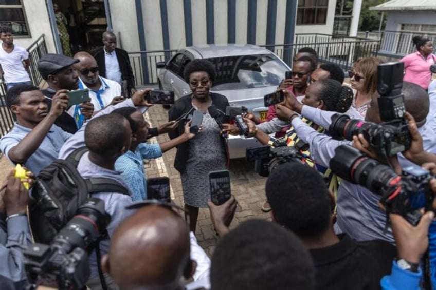 Opposition politician Victoire Ingabire outside the High Court in Kigali