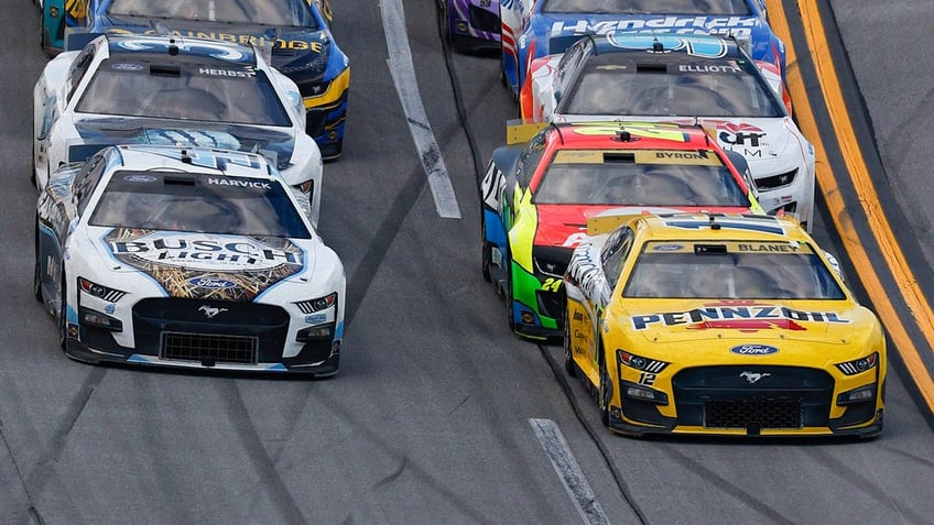 ryan blaney wins talladega by 0012 kevin harvick dqd over windshield issue