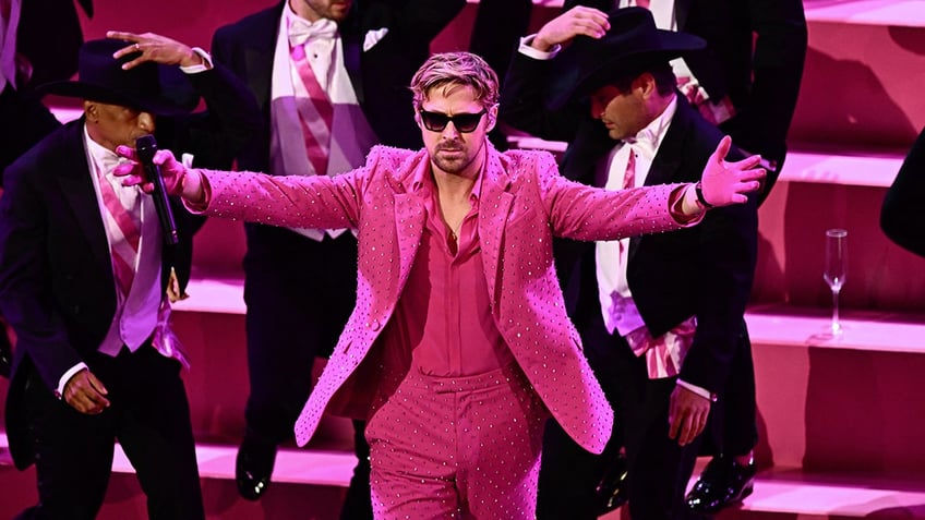 Ryan Gosling performing "I'm Just Ken" at the Academy Awards in a pink suit