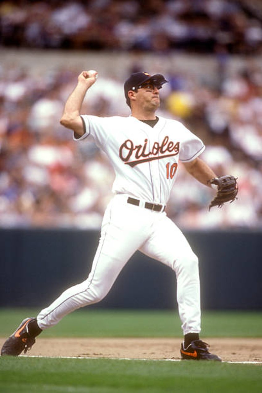 Ryan Minor of the Baltimore Orioles fields a ground ball during a baseball game against the Cleveland Indians on September 4, 1999 at Camden Yards in...