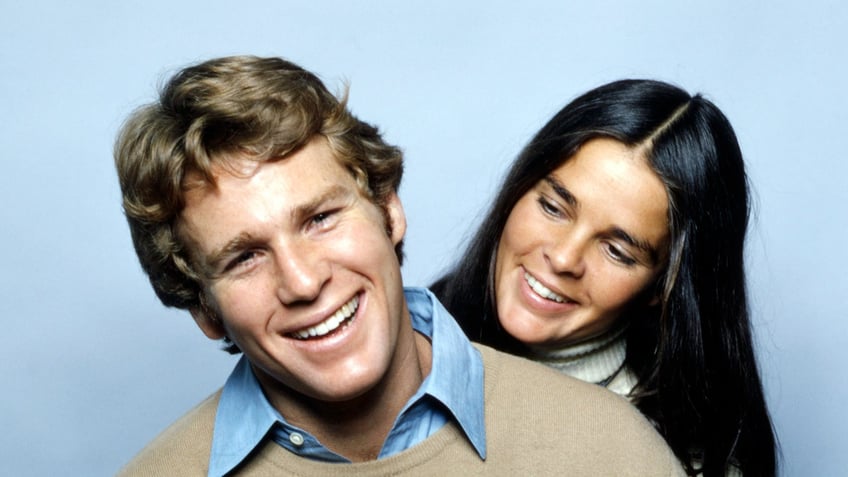 Ryan ONeal and Ali MacGraw in a promo for "Love Story"