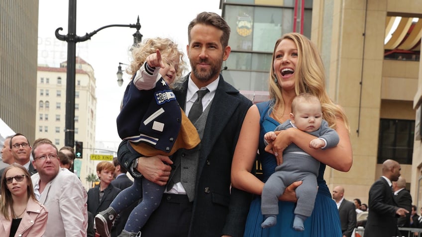 Ryan Reynolds and Blake Lively with their daughters