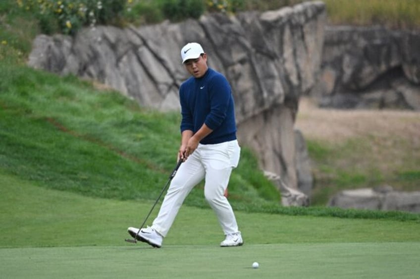 So close: Tom Kim watches his putt to win the Genesis Championship slide past the 18th hol