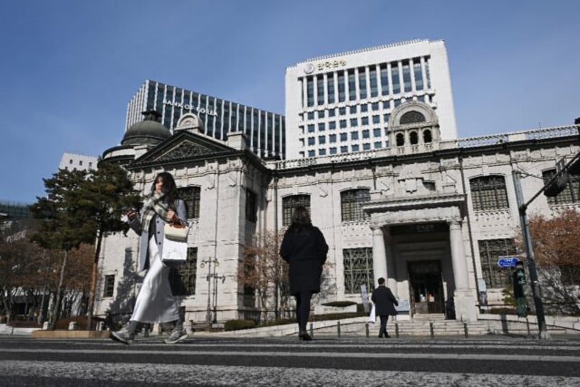 South Korea's central bank on Tuesday slashed interest rates and its annual growth forecas