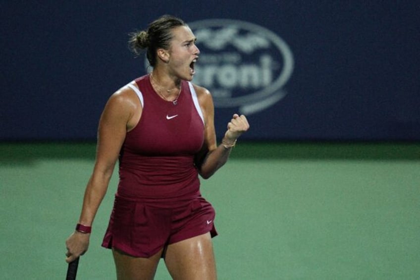 Third-ranked Aryna Sabalenka of Belarus reacts after winning a point in a quarter-final vi