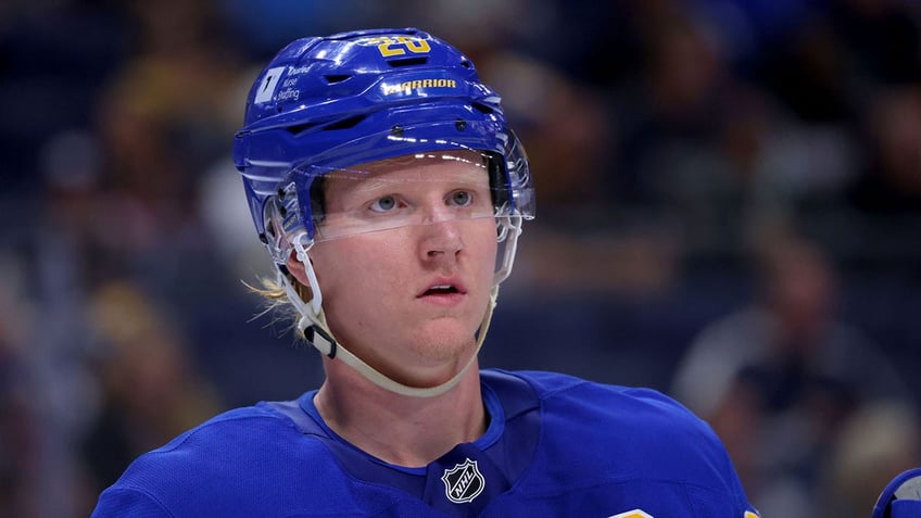 Rasmus Dahlin looks on ice