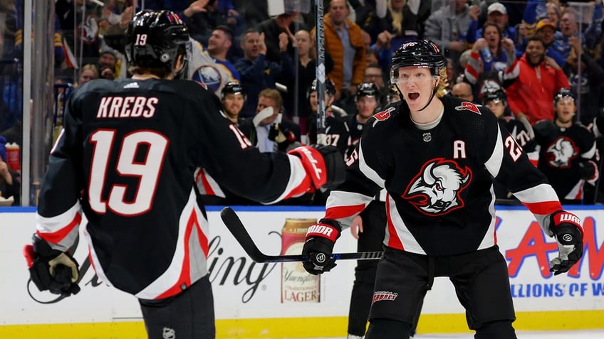 Peyton Krebs and Rasmus Dahlin on ice together