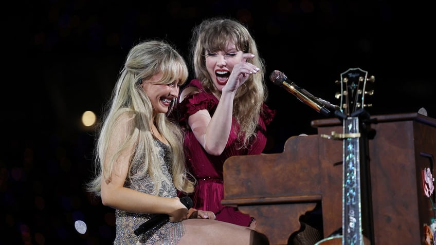 Taylor Swift and Sabrina Carpenter perform during Eras Tour