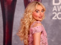 Sabrina Carpenter shares new album cover 'approved by God' after backlash over racy image