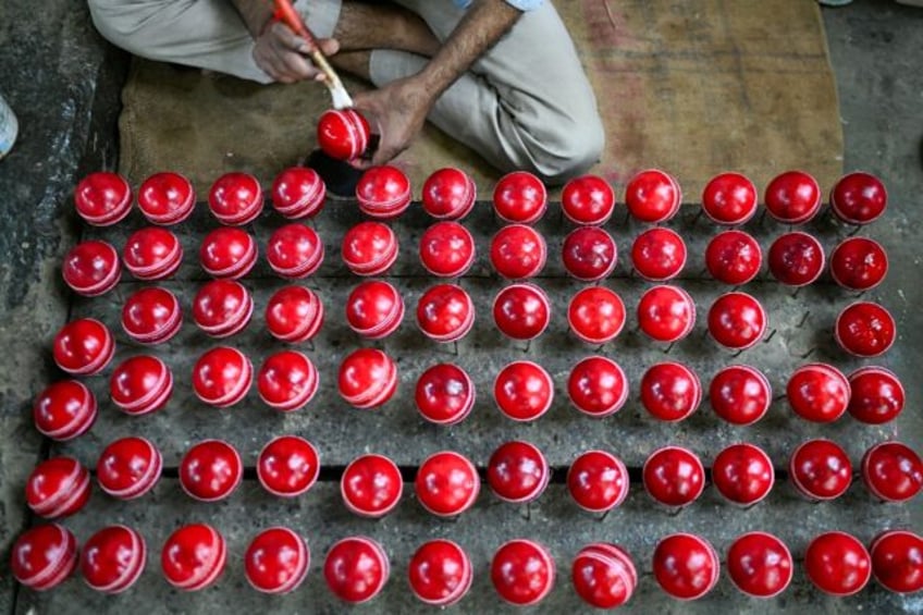 sacred cow ball makers break taboos for indias favourite sport