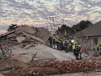 S.Africa rescuers set hopes on collapsed building’s basement