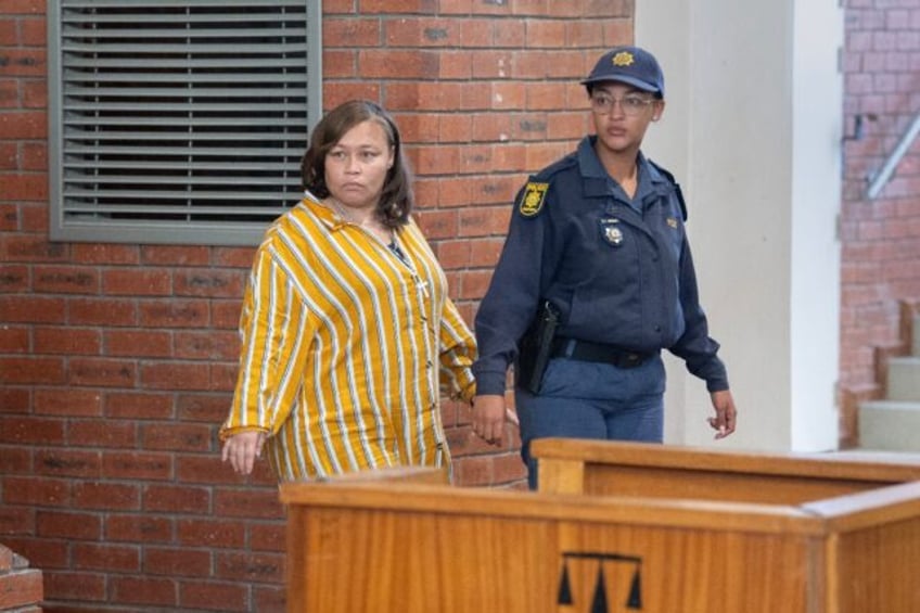 Kelly Smith (L) was found guilty of trafficking her six-year-old daughter