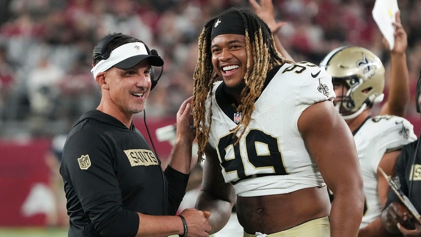 Dennis Allen and Chase Young