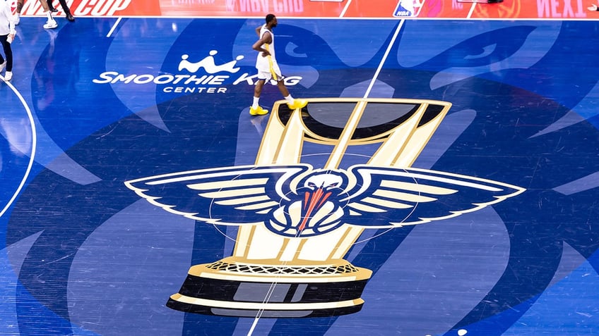 Pelicans logo on court