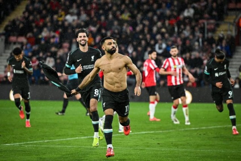 Liverpool's Mohamed Salah (C) celebrates after scoring against Southampton