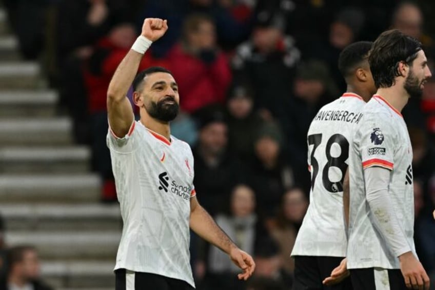 Mohamed Salah (left)scored twice in Liverpool's 2-0 win at Bournemouth