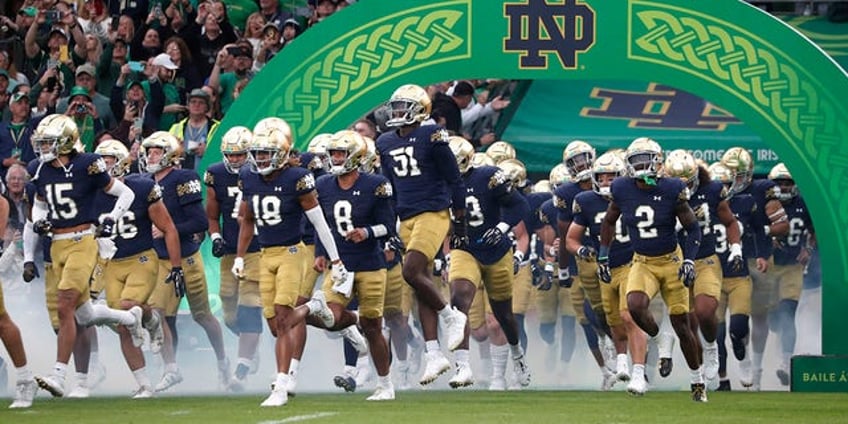 sam hartman fires 4 touchdown passes as notre dame crushes navy in dublin