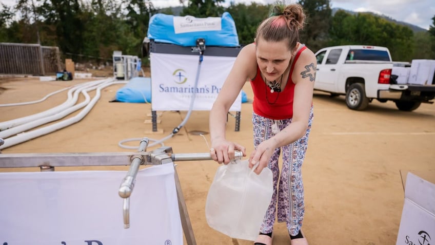 Woman filling water