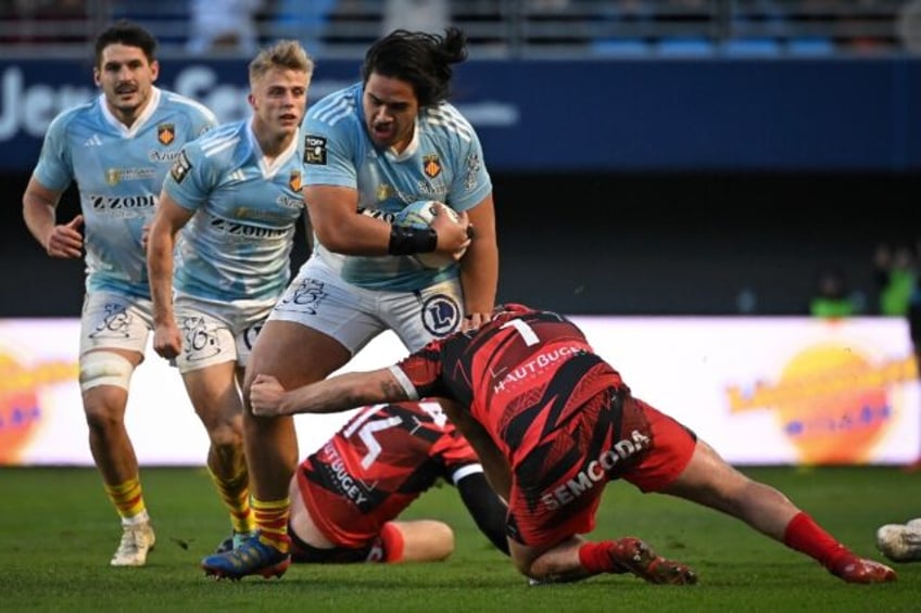 Passport problem: Perpignan lock forward Posolo Tuilagi (centre)