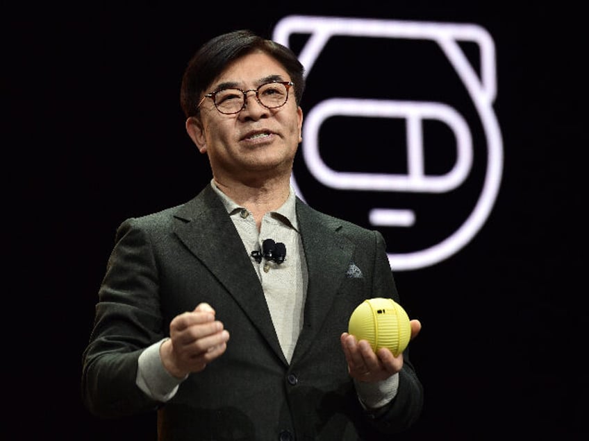 LAS VEGAS, NEVADA - JANUARY 06: Samsung Electric President and CEO of Consumer Electronics Division H.S. Kim displays Ballie, an AI enable companion robot, during an press event for CES 2020 at the Mandalay Bay Convention Center on January 6, 2020 in Las Vegas, Nevada. CES, the world's largest annual …