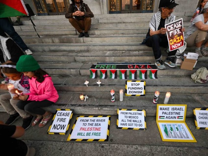 SAN FRANCISCO, CALIFORNIA - OCTOBER 18: Pro-Palestinian protesters are gathered outside of the City Hall in San Francisco, California, United States to protest and condemn recent actions by the government of Israel on October 18, 2023. (Photo by Tayfun Coskun/Anadolu via Getty Images)