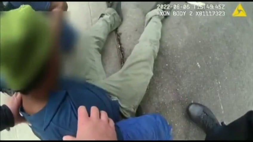 san francisco police accused of racial bias in arrest of armed suspect firing at them on bodycam